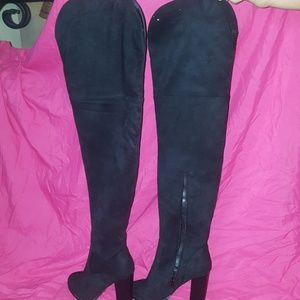 Thigh high black boots
